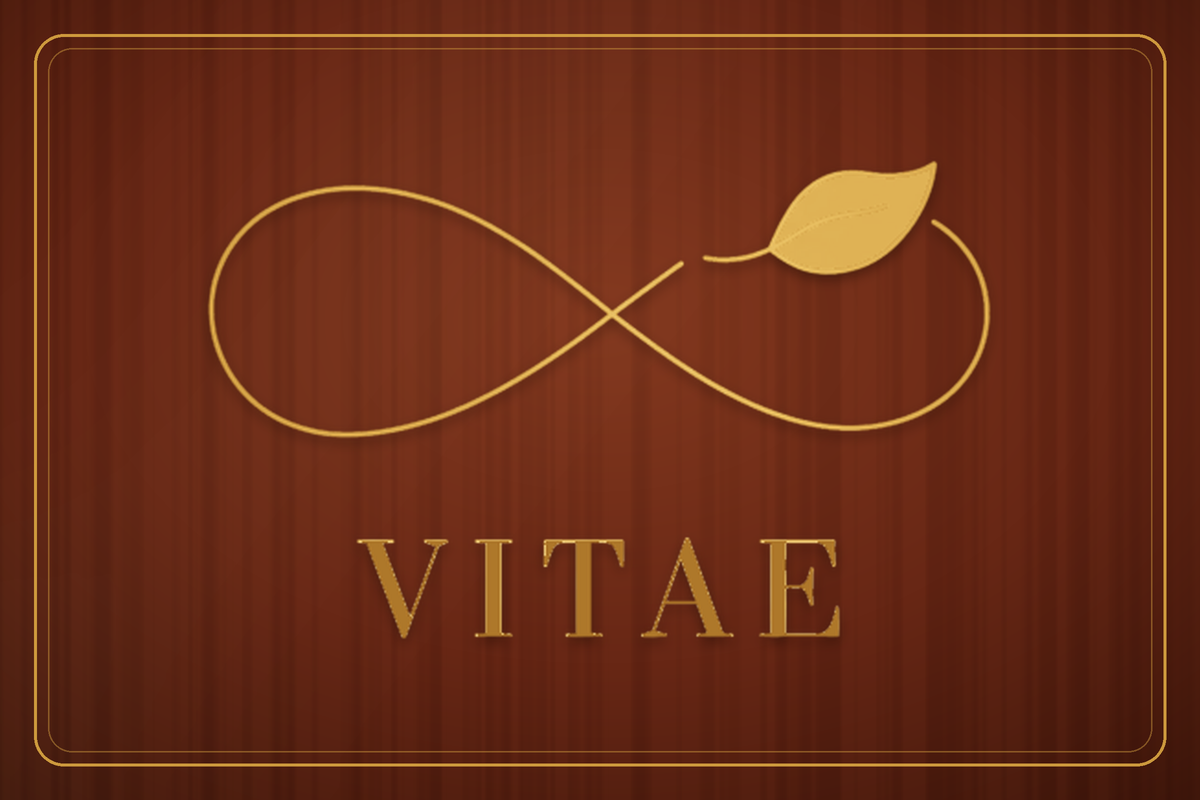 Vitae Wellness logo — a gold infinity symbol with a leaf above the word VITAE in gold, on a polished mahogany plaque